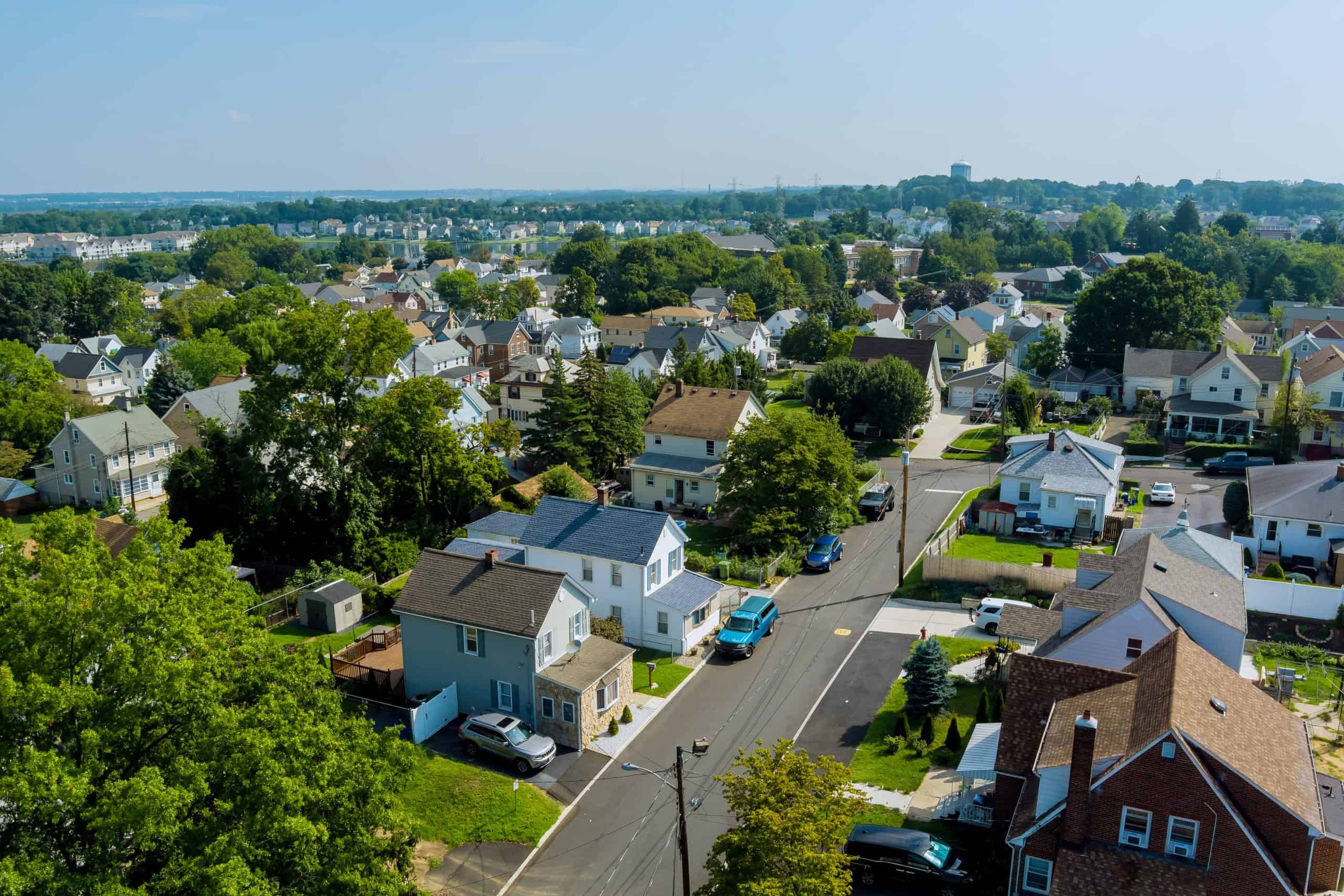 Aerial view of residential neighborhoods showcasing roofing and siding services.