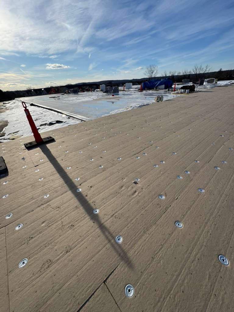 Roof deck with numerous fasteners for roof replacement in New Jersey