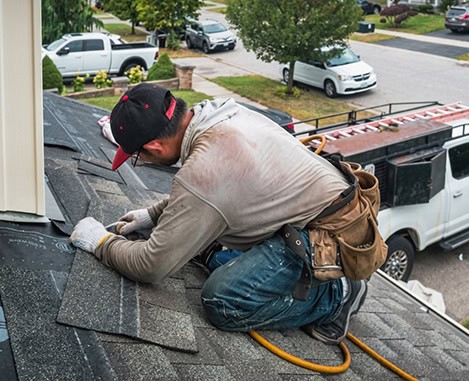 BlueSky roofing crew installing asphalt shingles on a residential roof in NJ