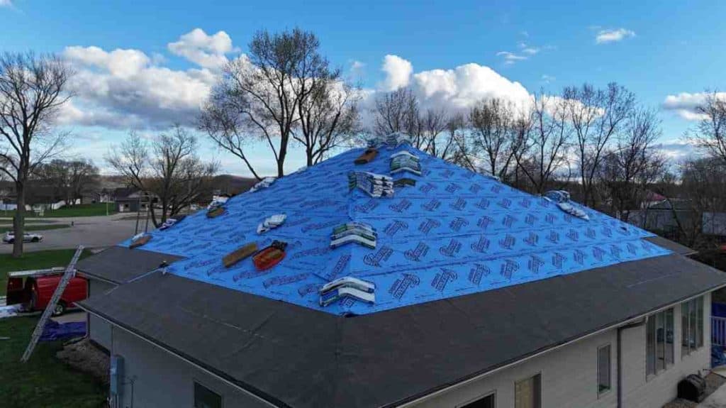 BlueSky roofing crew performing roof replacement on a residential home in New Jersey