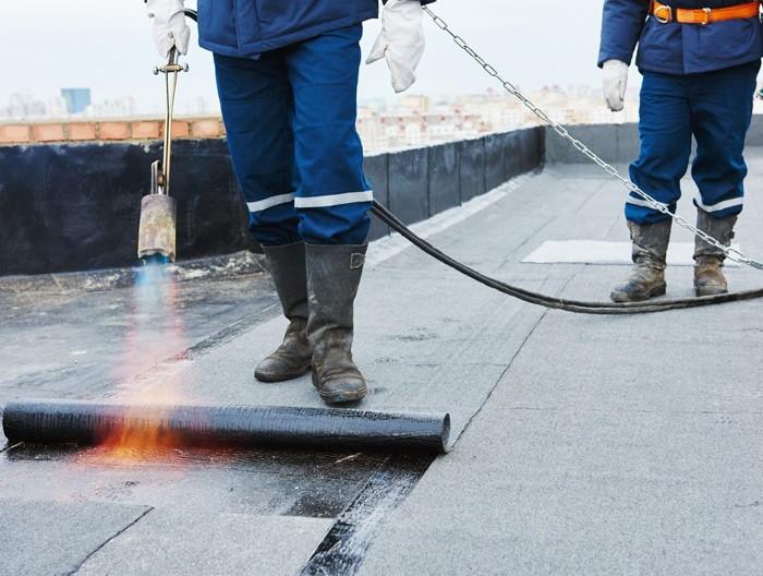 Flat roof repair service in Hoboken NJ with professional roofing crew