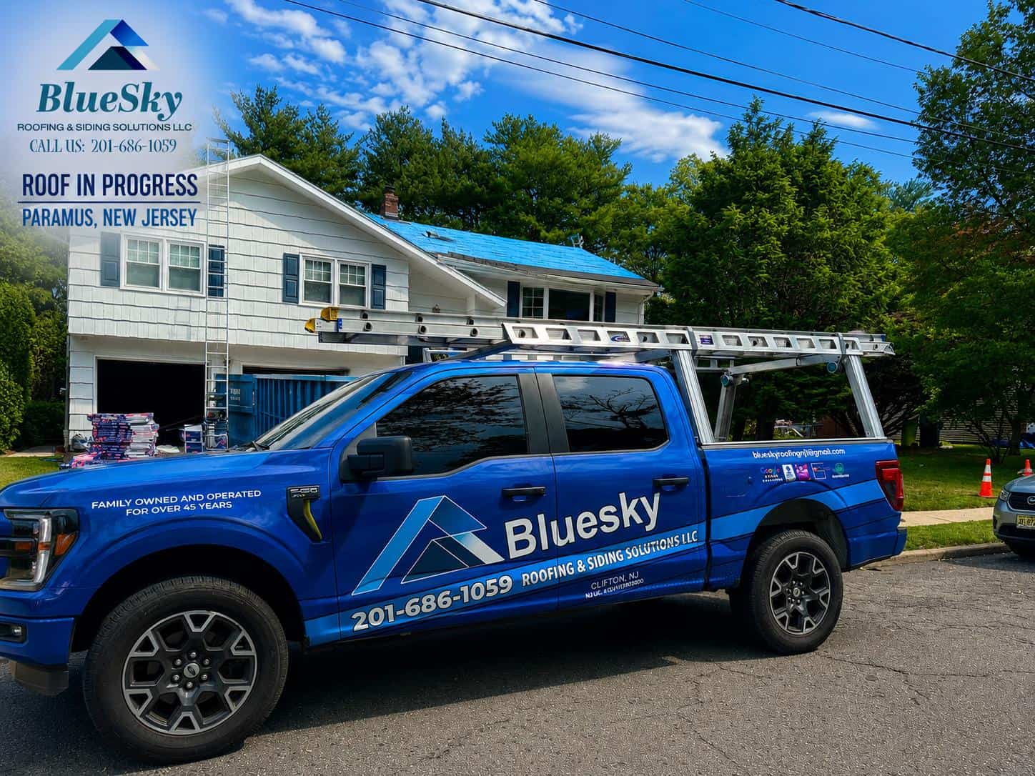 BlueSky Roofing truck with ladder rack in front of a white house; roof replacement in progress in Paramus, NJ.