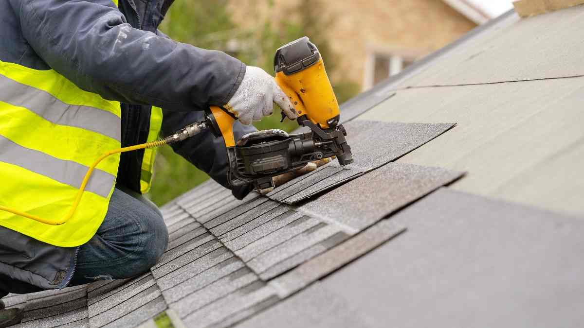 BlueSky Roofing crew installing asphalt shingles on a residential roof